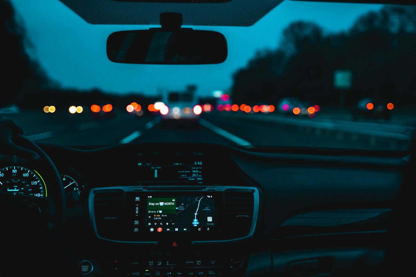 car on road during daytime auto
